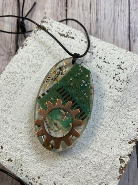 Resin necklace- gears, circuit board, and bits 1