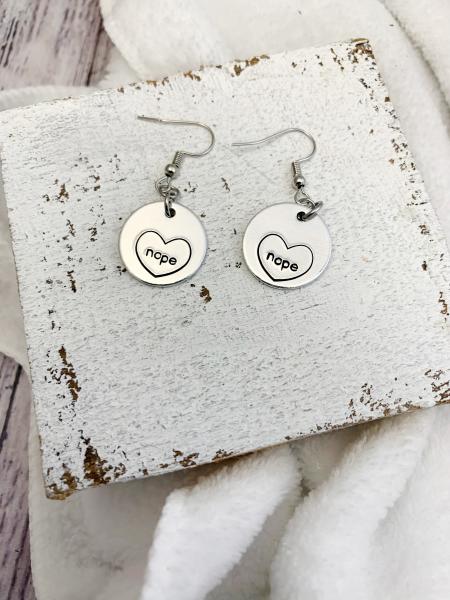 Conversation heart earrings nope picture