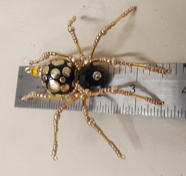 Steampunk Black /Gold Splotched Beaded Spider picture