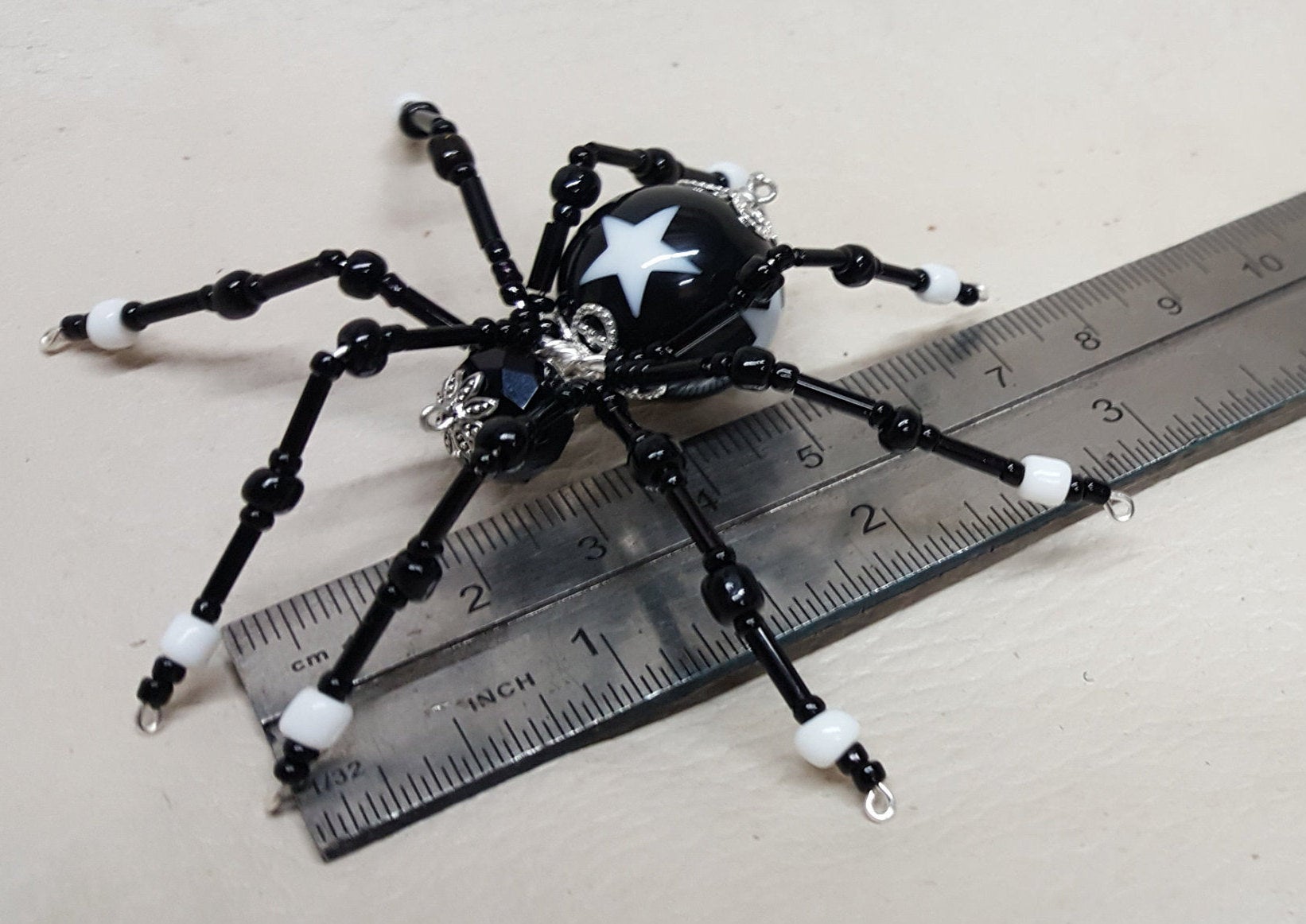 Steampunk/Christmas Black Star Beaded Spider picture