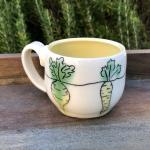 yellow and green veggie tea cup