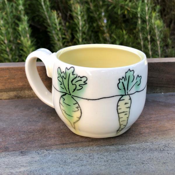 yellow and green veggie tea cup