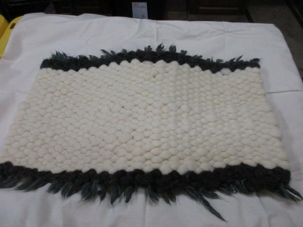 Beautiful White with Black edges Texel Wool Peg Loom rug picture