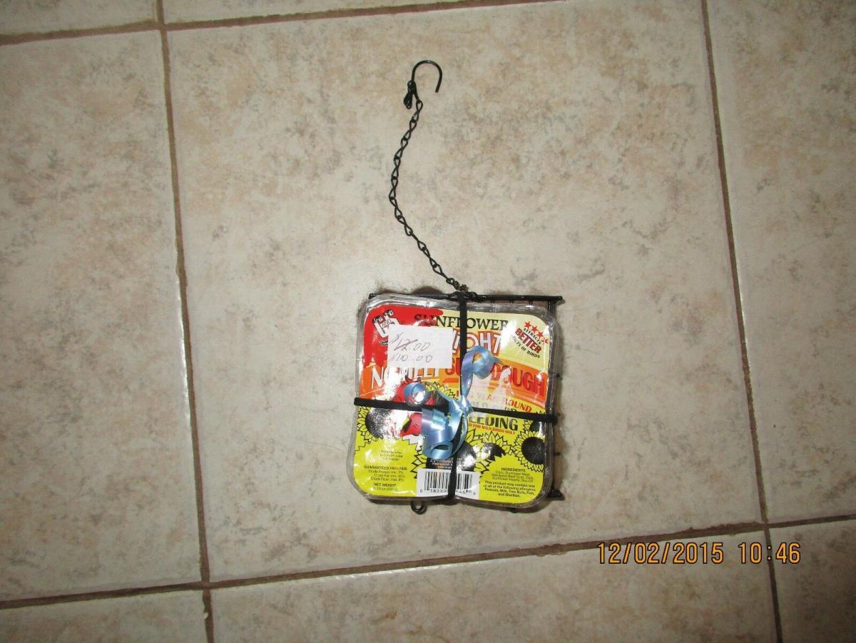 Handcrafted wire suet feeder/nester with suet and Alpaca fiber for nesting picture