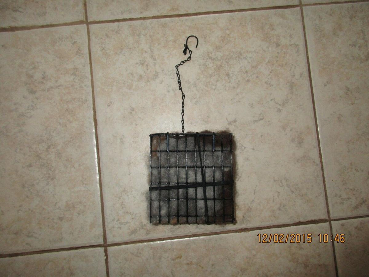 Handcrafted wire suet feeder/nester with suet and Alpaca fiber for nesting picture