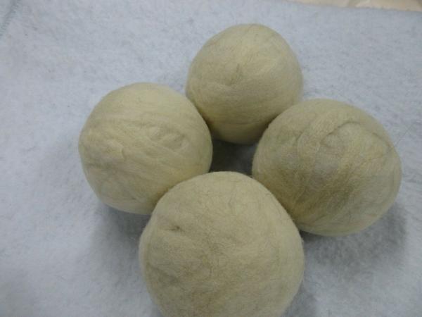 4 Dryer Balls Made of Solid Wool Roving picture