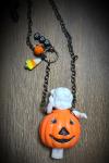 Pumpkin vintage doll necklace