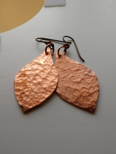 Copper textured bulb shapped earrings picture