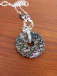 Sterling Silver Wire Wrapped Rhodonite Doughnut Pendant