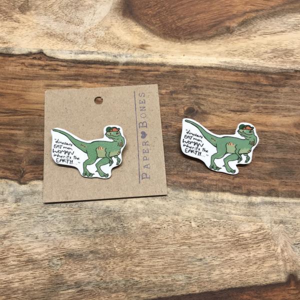 Dino Eats Man - Pin or Magnet