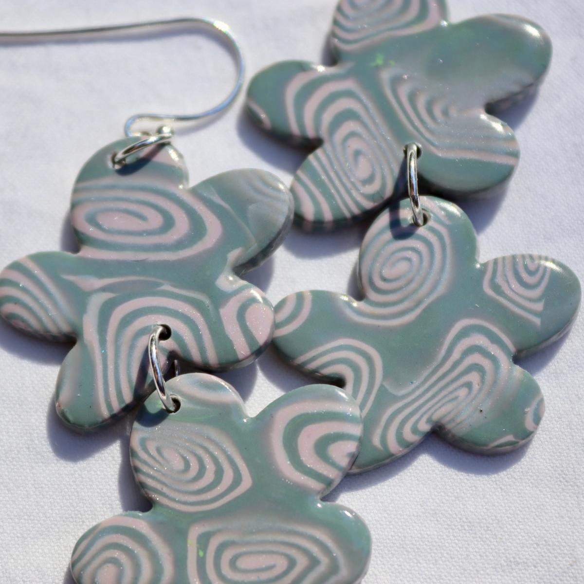 Two Drop Swirly Flower Dangly Earrings picture