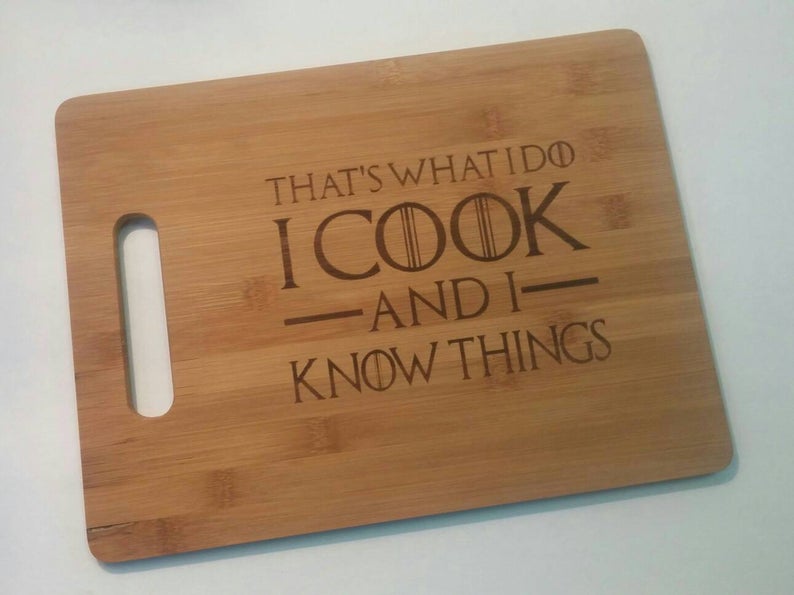 I Cook and I Know Things Cutting Board picture