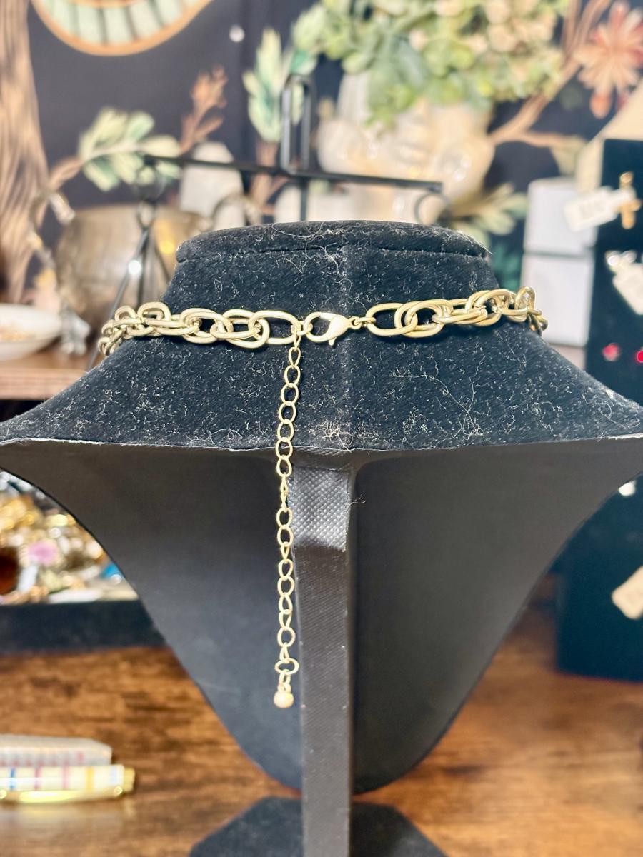 Grey Moss Agate Crystal Pendent on a Gold Tone Chain picture