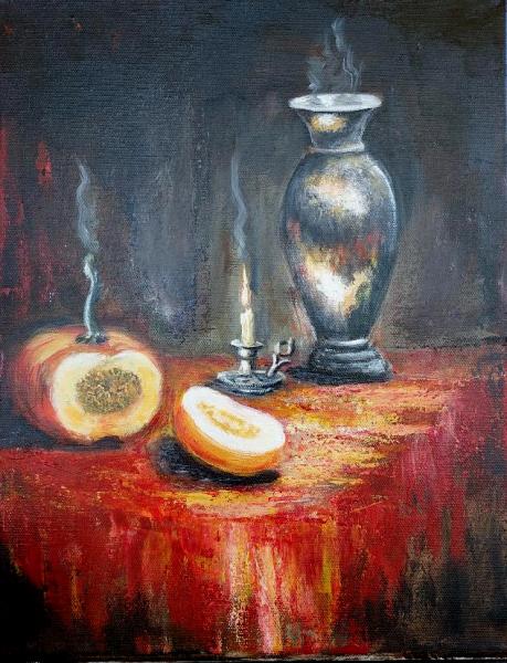 Pumpkin and candle