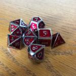 Red with Chrome Lettering Metal Dice Set