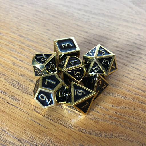 Black with Gold Lettering Metal Dice Set picture