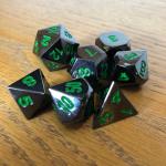 Black with Green Lettering Metal Dice Set