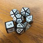 White with Black Lettering Metal Dice Set