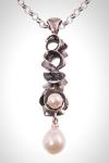Long Pearl Pendant with a Dark Patina