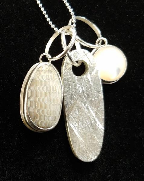 Fossil Clam & Mother-of-Pearl Pendant Cluster picture