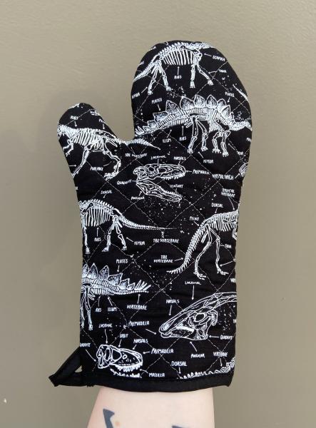 Glow in the dark dinosaur bones oven mitt picture