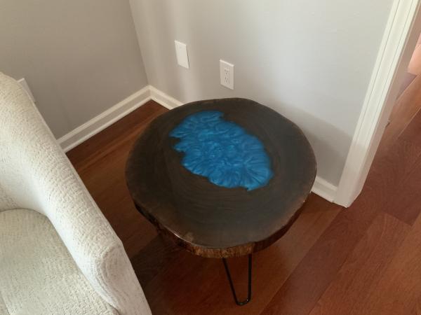 Hollow walnut tree trunk “lava” side table. picture