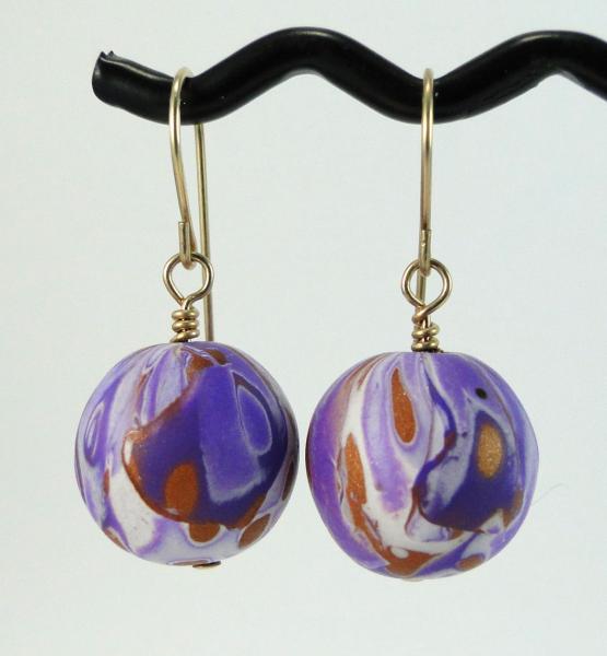 Purple and gold earrings