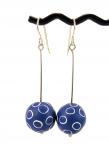 Blue dangly earrings, with white circles