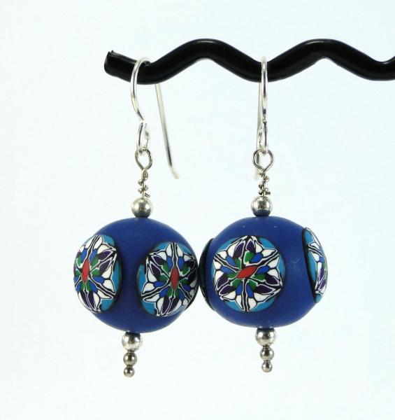 Teal bead earrings with onlaid design picture