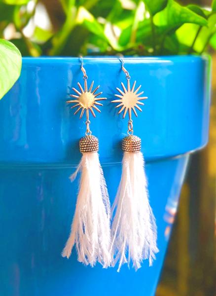 Wispy White Ostrich Feathers and Silver Suns