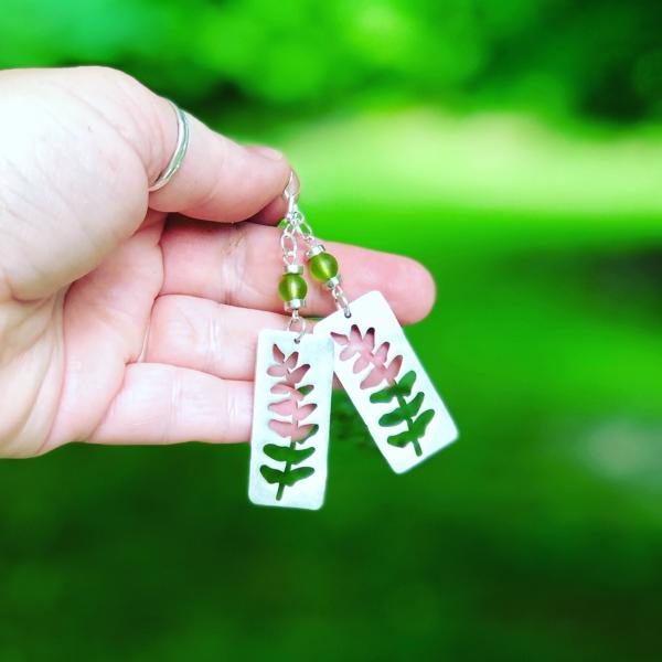 Silver Fern Leaf Cutouts with Green Sea Glass picture