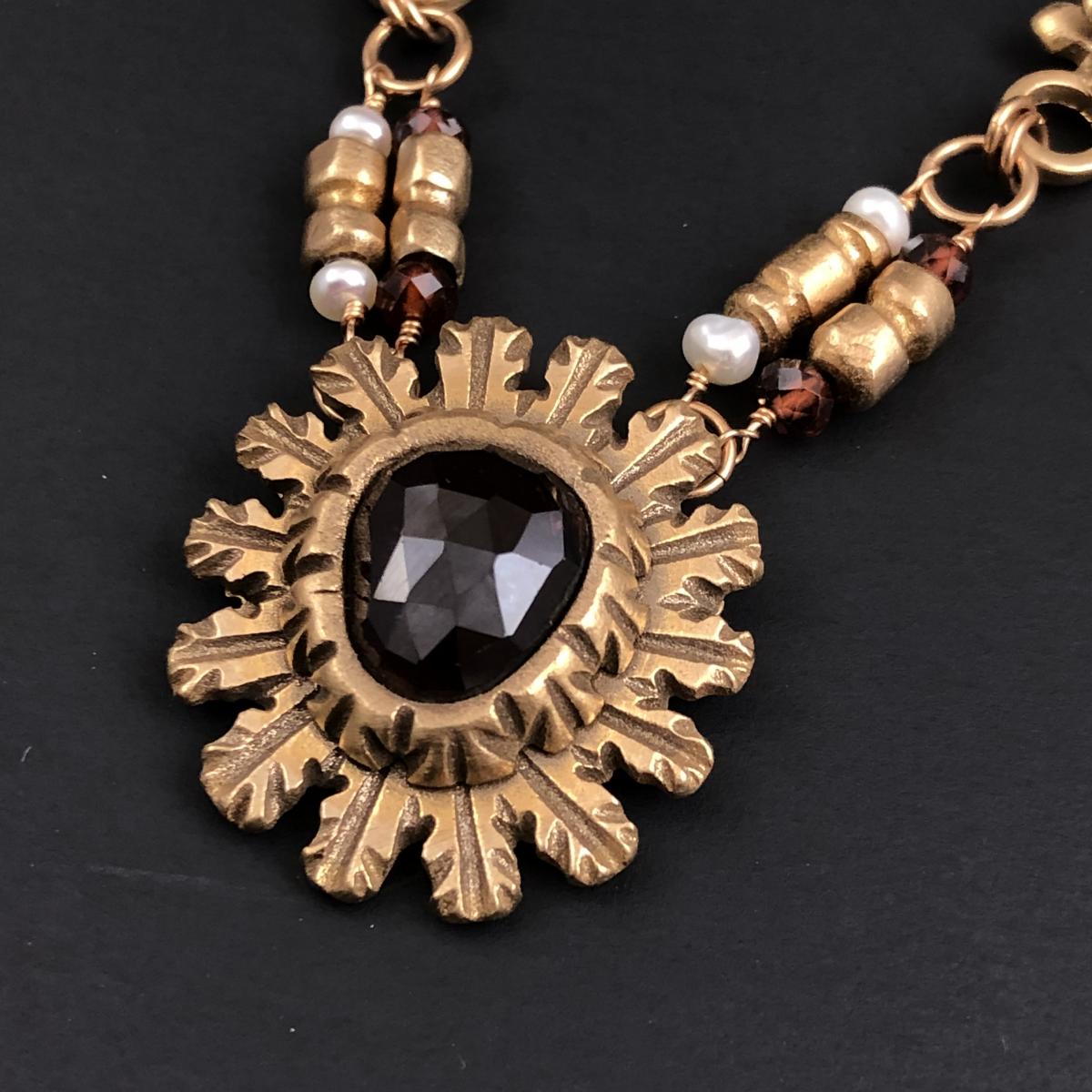 Hand Carved Bronze and Garnet Pendant Necklace picture