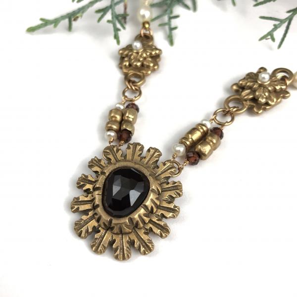 Hand Carved Bronze and Garnet Pendant Necklace picture