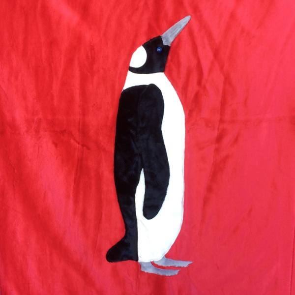 Emperor Penguin on Red Applique Blanket picture