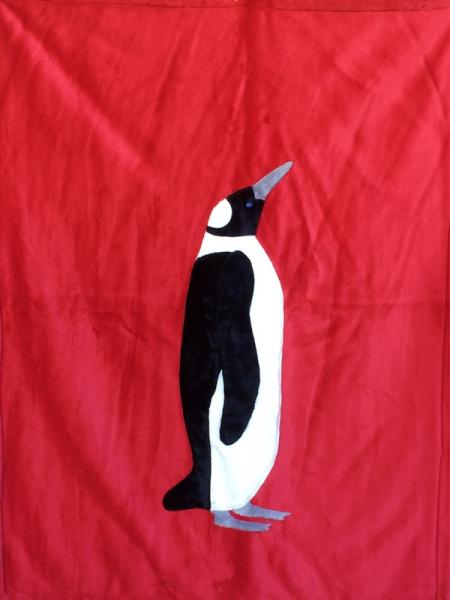 Emperor Penguin on Red Applique Blanket picture