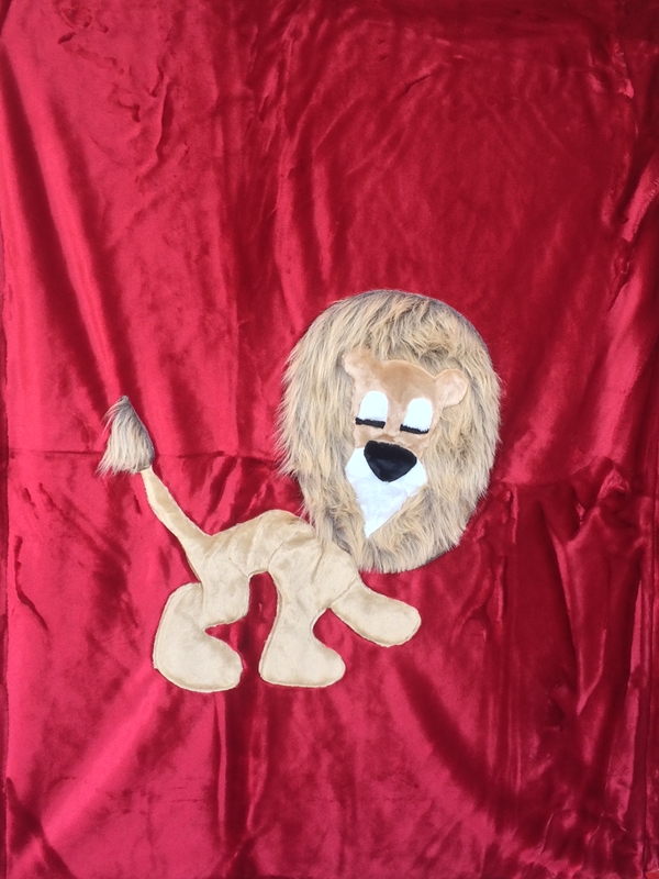 Lion Applique on Red Blanket picture