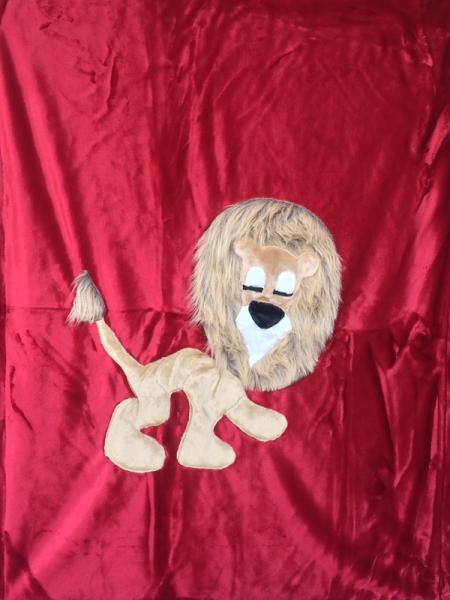 Lion Applique on Red Blanket picture