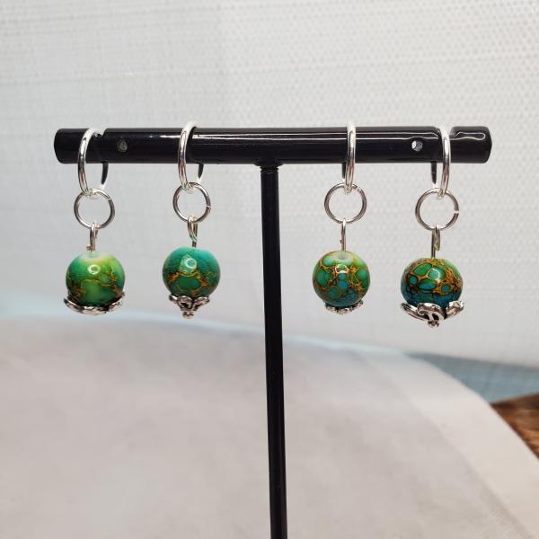 Green Crackle beads with caps picture