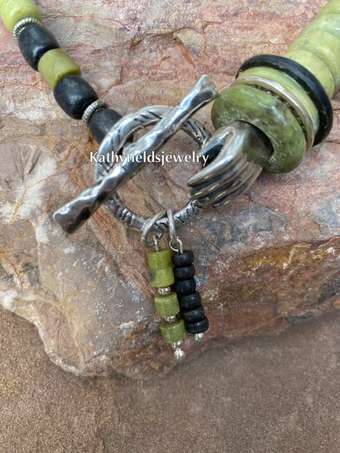 A toggle silver hand charm necklace picture