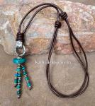 A mini silver hand charm turquoise necklace