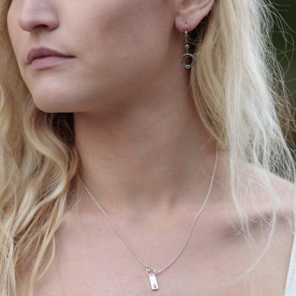 Modern Simplicity: Bar and Loop Diamond Necklace picture