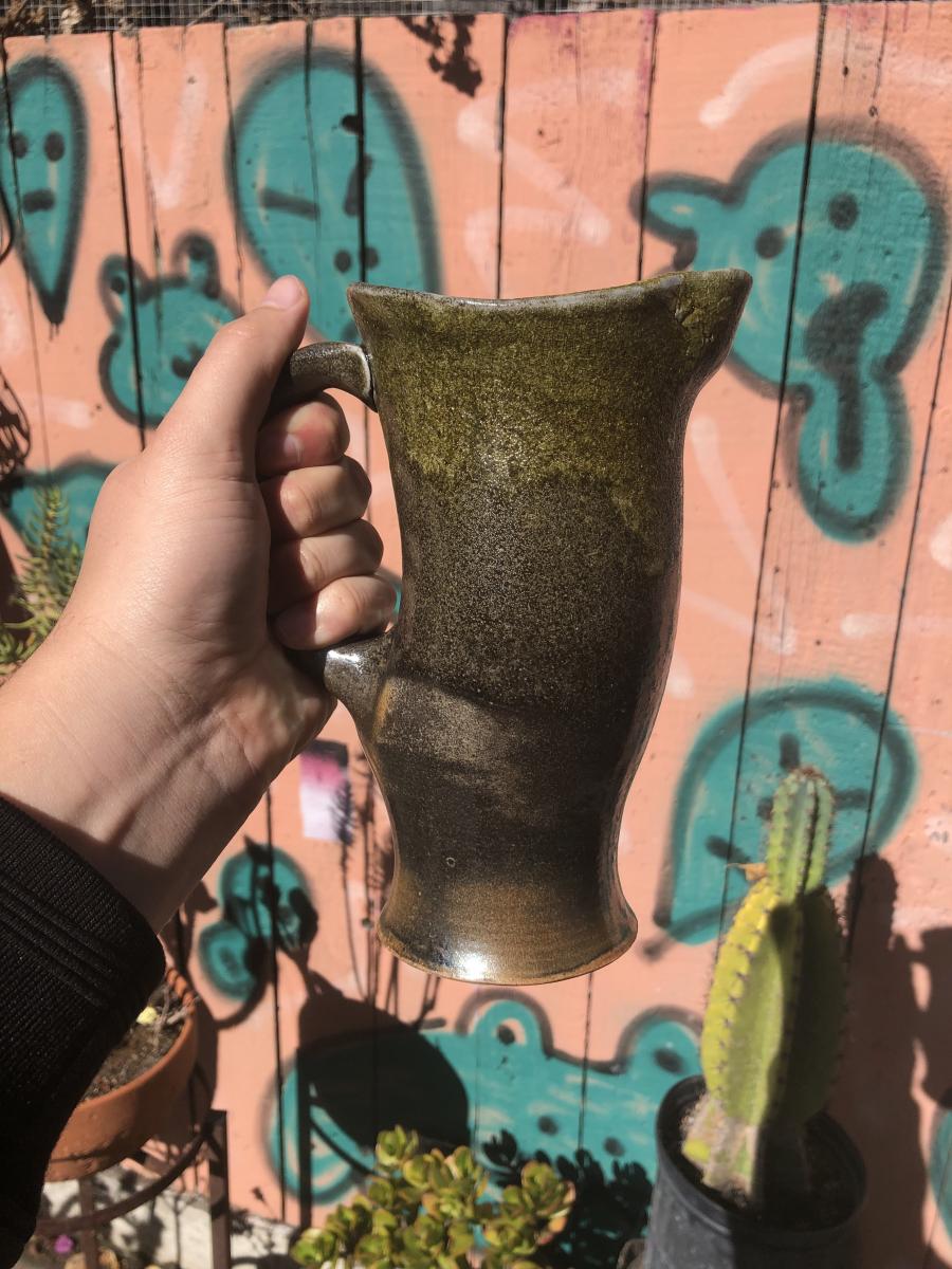 Tall Darted Ceramic Green Pitcher w/ Unique Glaze Reaction picture