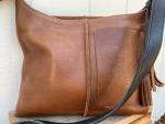 Crossbody, Brown leather with black strap and Exterior pocket (zipper)
