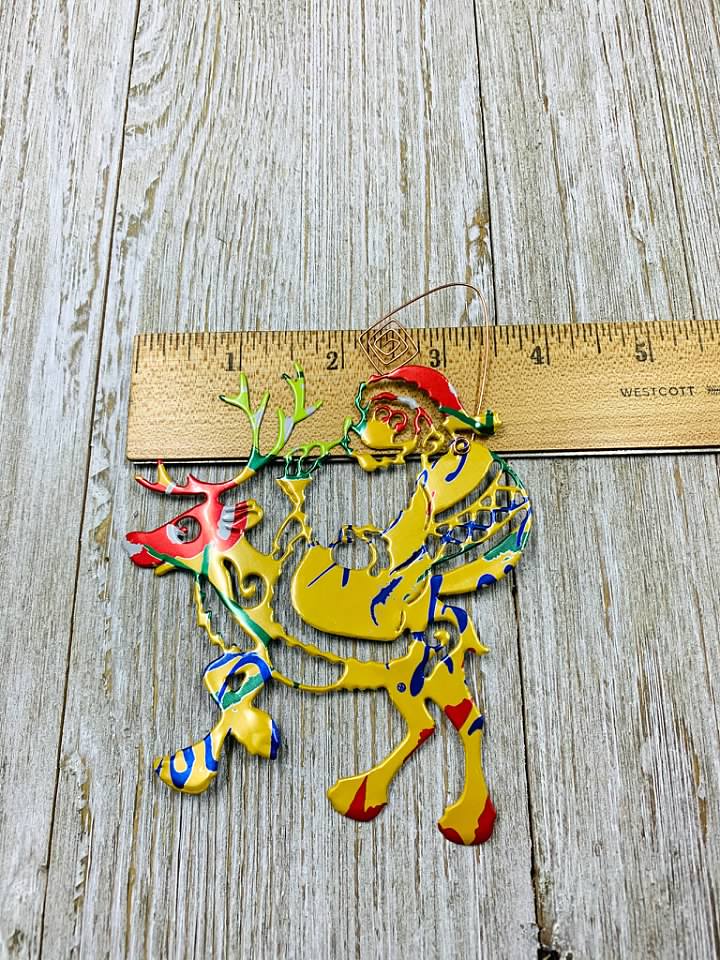 Santa Riding a Reindeer Ornament made from Recycled Aluminum Can picture