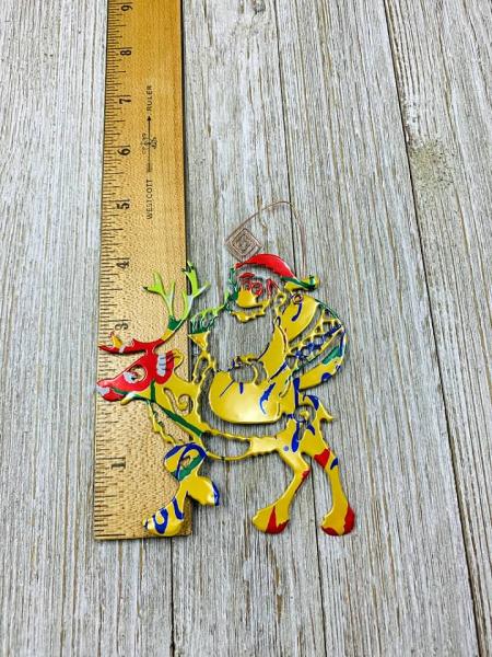 Santa Riding a Reindeer Ornament made from Recycled Aluminum Can picture