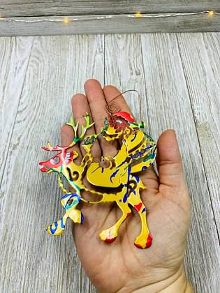 Santa Riding a Reindeer Ornament made from Recycled Aluminum Can picture