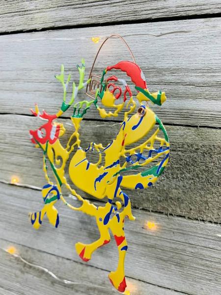 Santa Riding a Reindeer Ornament made from Recycled Aluminum Can picture