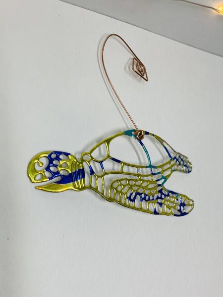 Sea Turtle Ornament Made From Repurposed Can picture