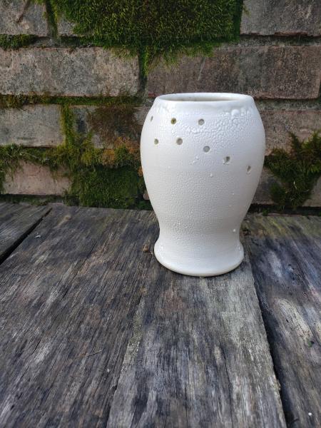 Vase with holes for flower arranging. picture