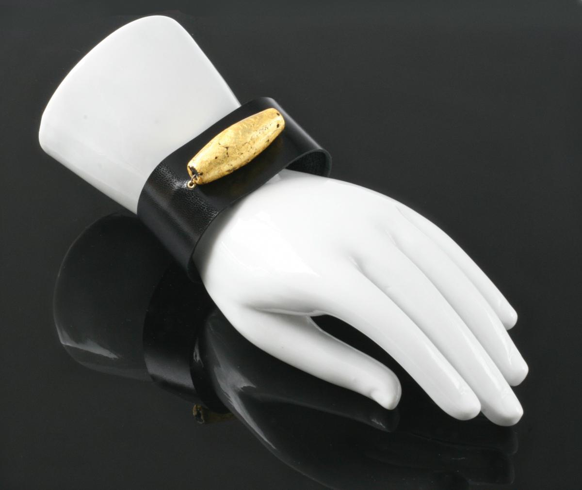 Good Luck Glow  23-Karat Gold on Lava Stone, Black Kid leather picture